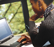 Businesswoman using laptop