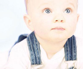 Baby wearing overalls